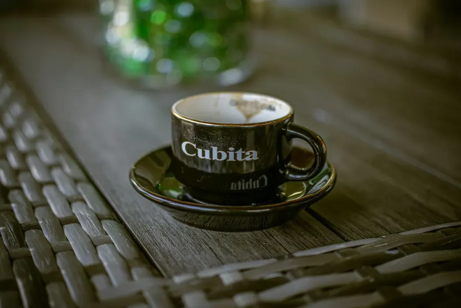 A small dark cup of Cuban espresso
