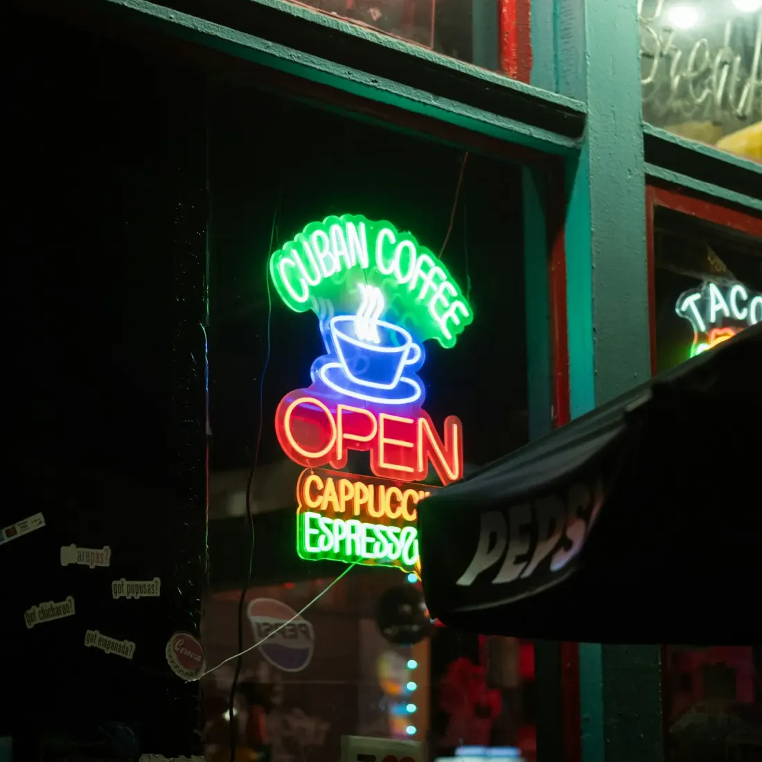 Neon sign advertising Cuban coffee, cappuccino and espresso
