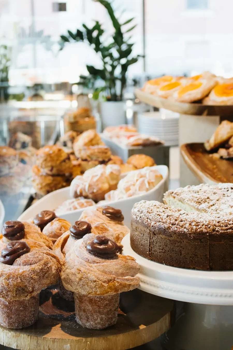 Pastries on display in a bakery case